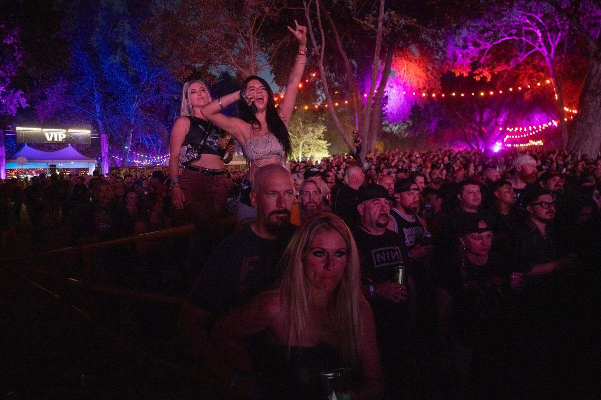 Festival attendees watch Slayer perform in the first day of the Aftershock festival on Thursday at Discovery Park.