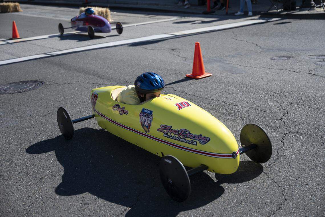 Evelyn Lacoste, 12, of Fair Oaks, races in the Folsom Historic District’s All-American Soap Box Derby in Folsom on Sunday.
