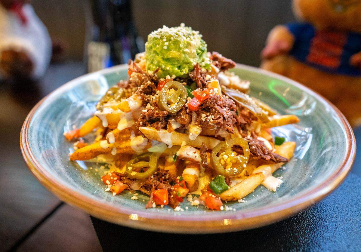 Loaded Barbacoa Fries are on the menu at Dave & Buster’s in Folsom, Tuesday, March 26, 2024.
