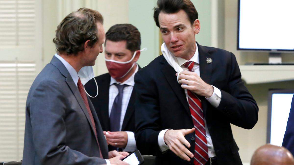 FILE - In this June 15, 2020, file photo, Republican Assemblyman and congressional hopeful Kevin Kiley, of Rocklin, confers with colleagues at the Capitol in Sacramento, Calif. (AP Photo/Rich Pedroncelli, File)