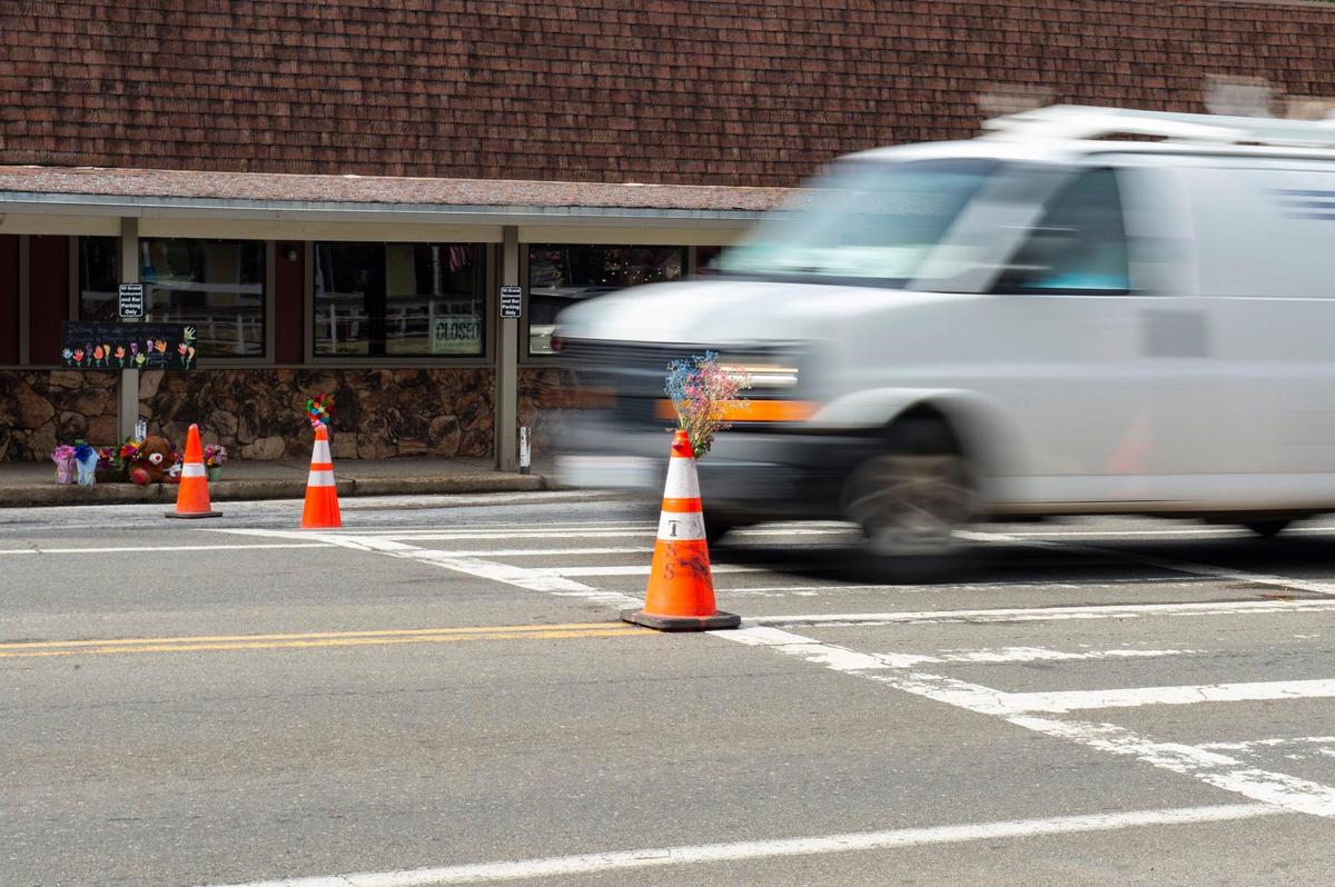 A van drives through the crosswalk in June where five children were struck by a driver on Pony Express Trail in Pollock Pines.