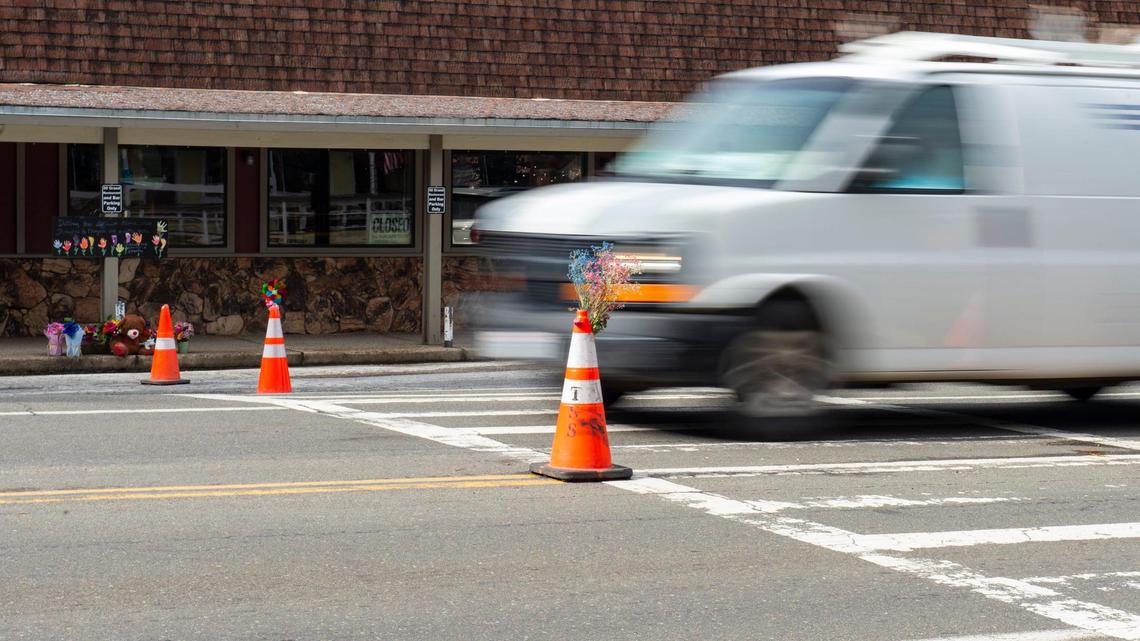 A van drives through the crosswalk on Monday, June 5, 2023.