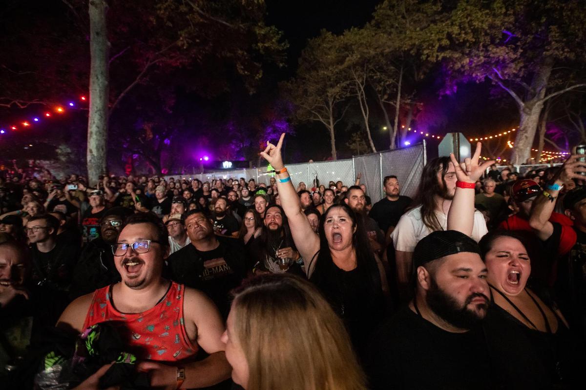 Karen, of Antioch, cheers on Rob Zombie as he performs on the Kolas Stage during the first of four days at the Aftershock rock festival Thursday, Oct. 6, 2022, at Discovery Park in Sacramento.