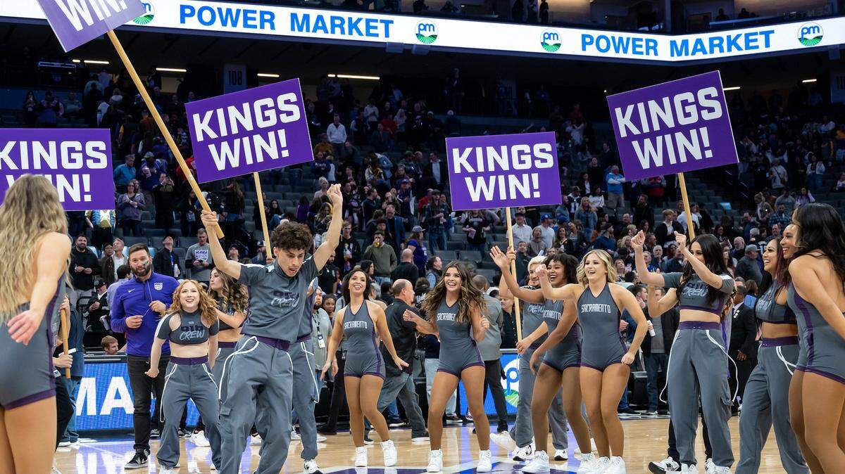 The 916 Crew celebrates at half court after the win against the Golden State Warriors in the NBA basketball game Sunday, Nov. 13, 2022, at Golden 1 Center in Sacramento. The Kings won 122-115.