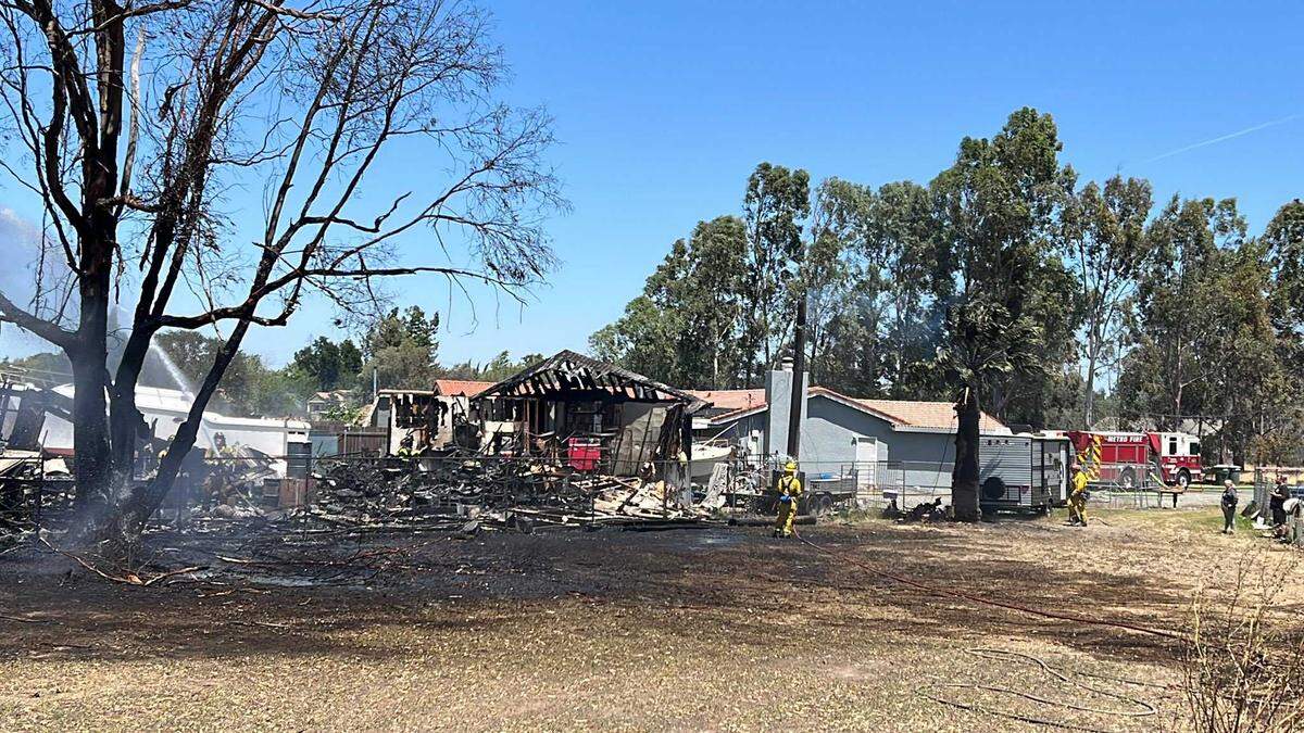 A 5-acre grass fire on Friday May 20, 2022, destroyed an outbuilding but firefighters stopped the flames from reaching nearby homes and livestock in the 7200 block of Dry Creek Road in Rio Linda, California.
