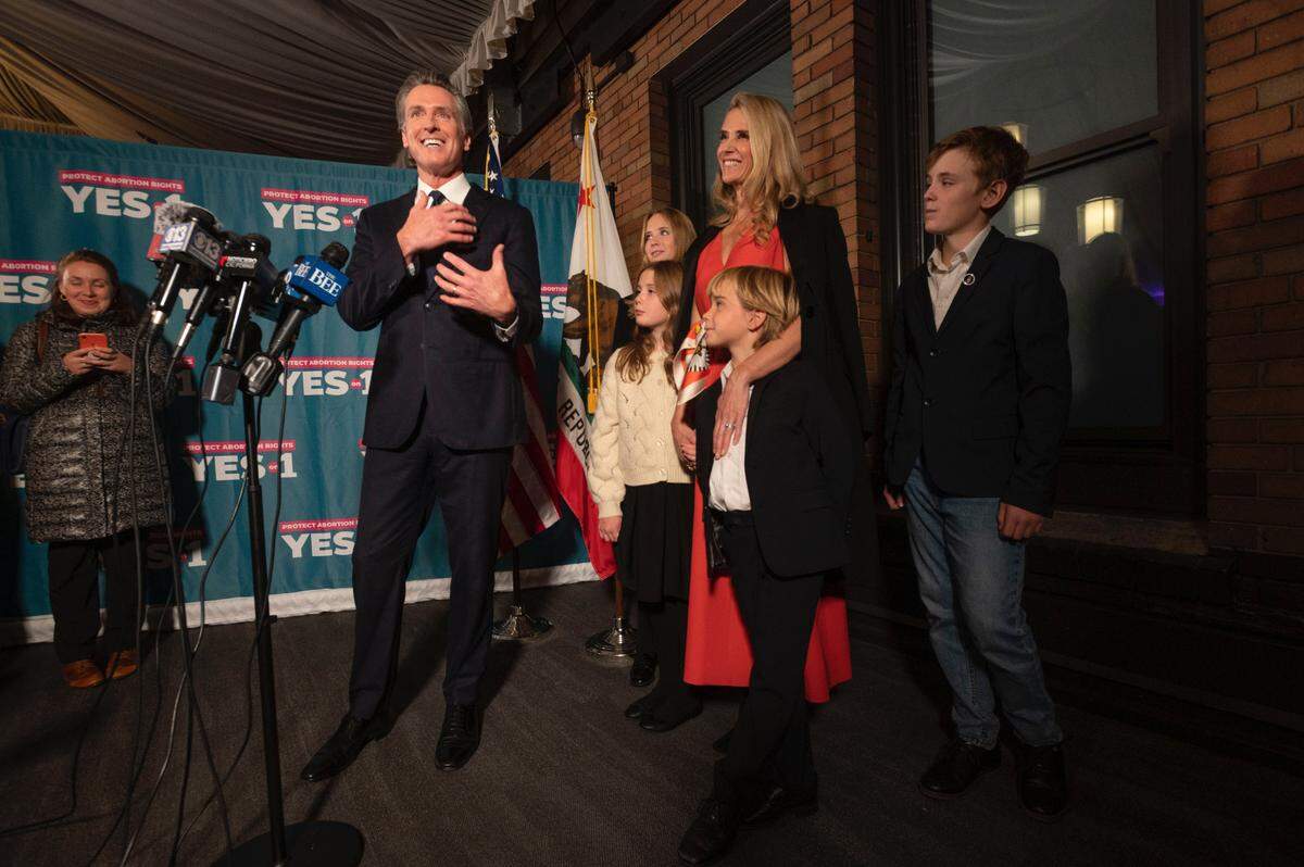 Gov. Gavin Newsom attends a watch party with first partner Jennifer Seibel Newsom and their children for Proposition 1, which would add rights for abortion and contraception to the California constitution, on Tuesday, Nov. 8, 2022 at the Citizen Hotel in Sacramento.