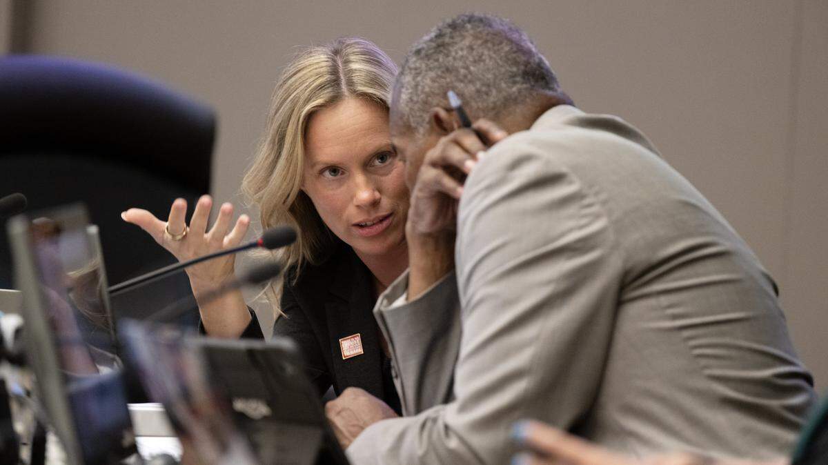 Council members Caity Maple and Rick Jennings discusses the framework of a proposed city-county joint powers authority to address homelessness during a Sacramento City Council meeting on April 28.