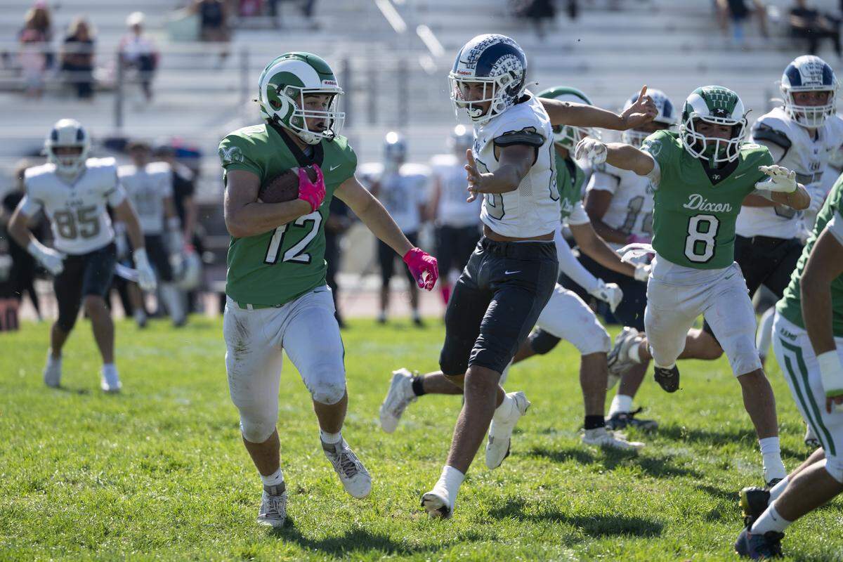 Dixon’s Wyatt Williams runs the ball during a varsity football game between Dixon and Casa Roble in Dixon on Saturday.