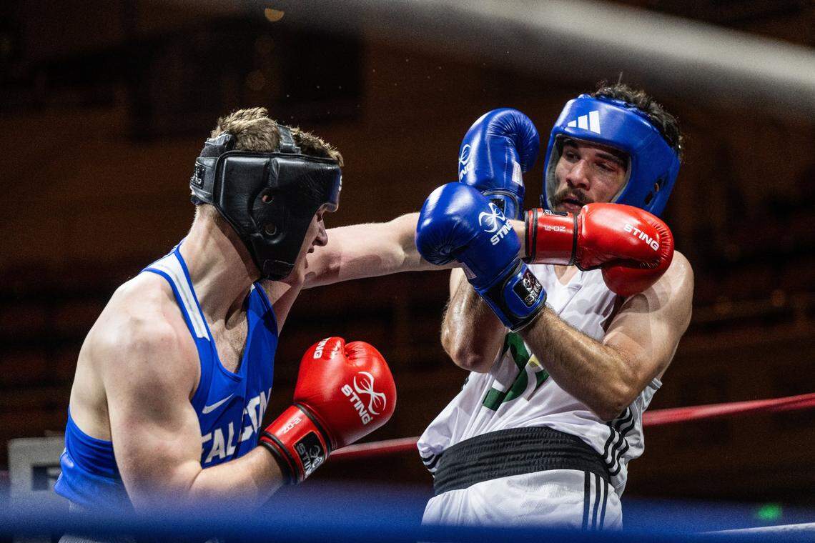 Austin Melendez of Sacramento State blocks a punch by Justin Bonilla of the Air Force Academy during the Causeway Boxing Classic at Memorial Auditorium on Friday.