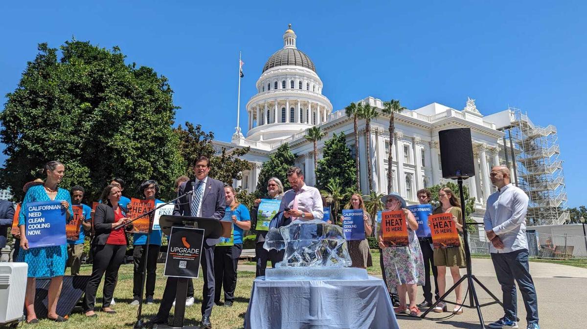 Advocates and lawmakers including Sen. Josh Becker of San Mateo and Assemblyman Matt Haney of San Francisco campaign for a suite of bills they hope to jump-start electrification for existing buildings in California, outside the state Capitol on Thursday, Aug. 17, 2023.