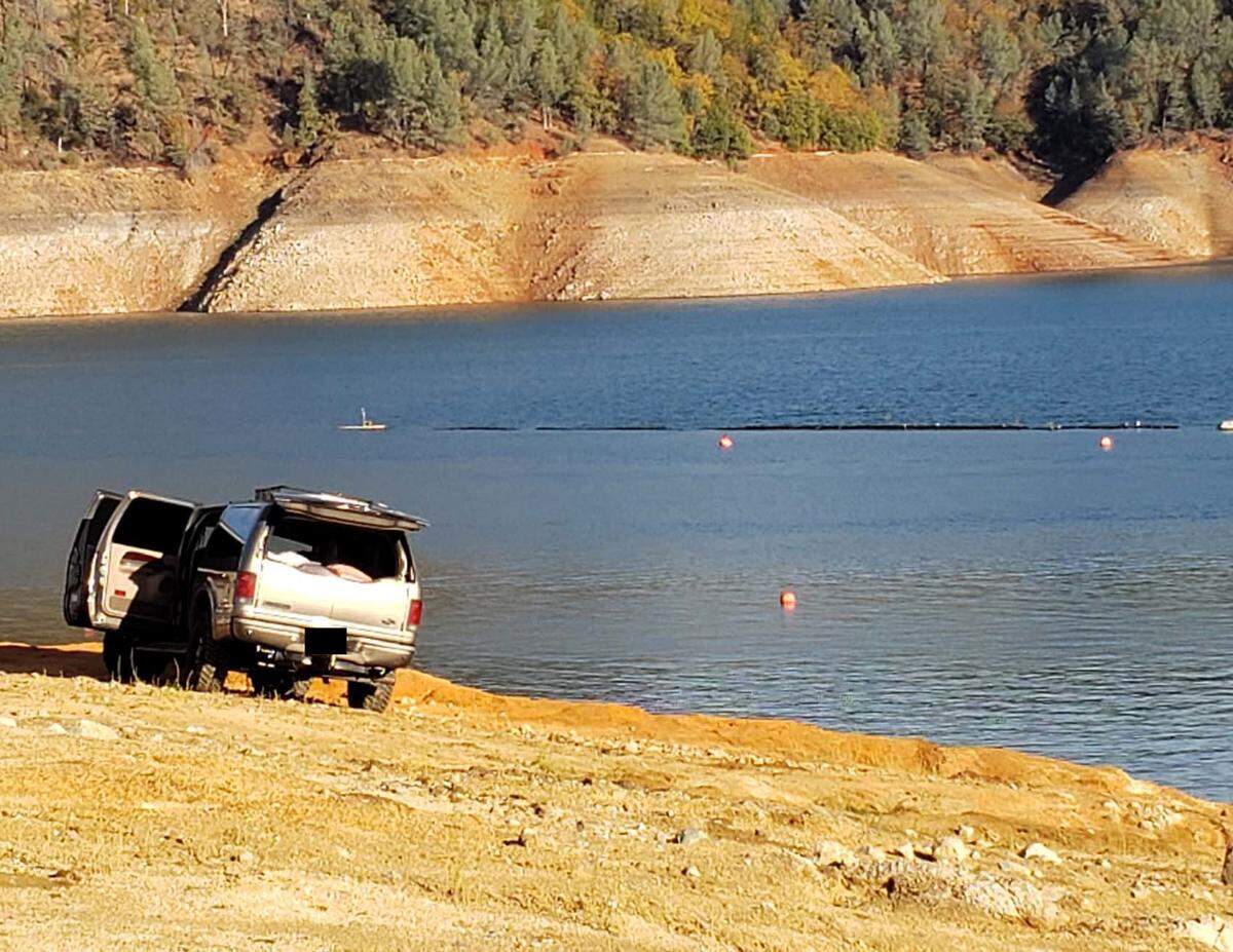 Federal prosecutors say Ponzi scheme suspect Matthew Piercey left an SUV on the beach before plunging into the frigid water of Shasta Lake to escape the FBI and CHP. HIs partner, Kenneth Wilton, pleaded guilty to wire fraud on Thursday.