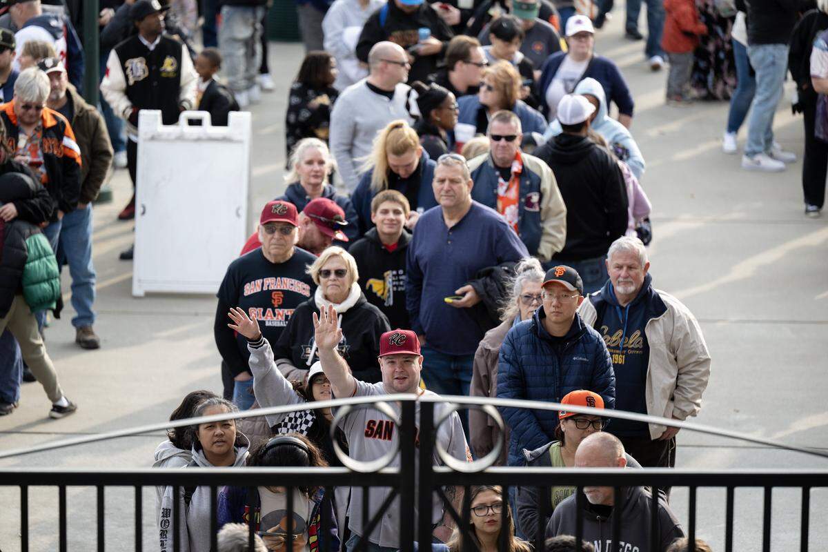 Fans wait outside the main gates in anticipation of the River Cats’ Opening Day for the 2025 season on March 28 at Sutter Health Park in West Sacramento.