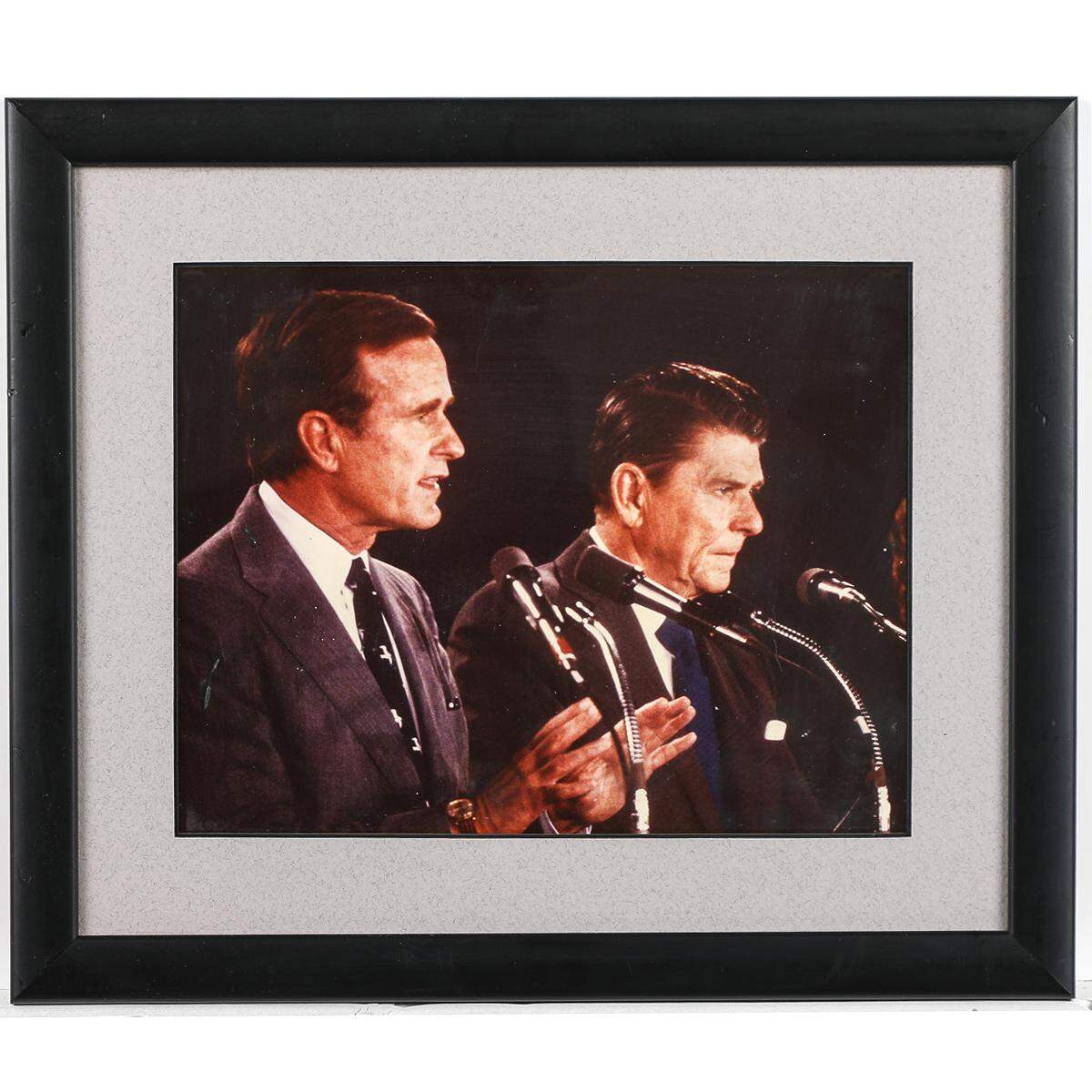 A framed color photograph of Ronald Reagan and George H.W. Bush. is lot number 40 in an auction of political memorabilia from the estate of Randy Paragary.