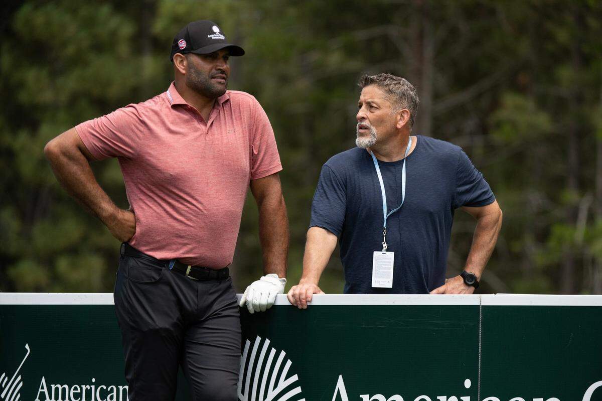 Former MLB players Albert Puljos and Fernando Viña chat at the 18th tee in the first round of the American Century celebrity golf championship on Friday, July 12, 2024, in Stateline, Nev.