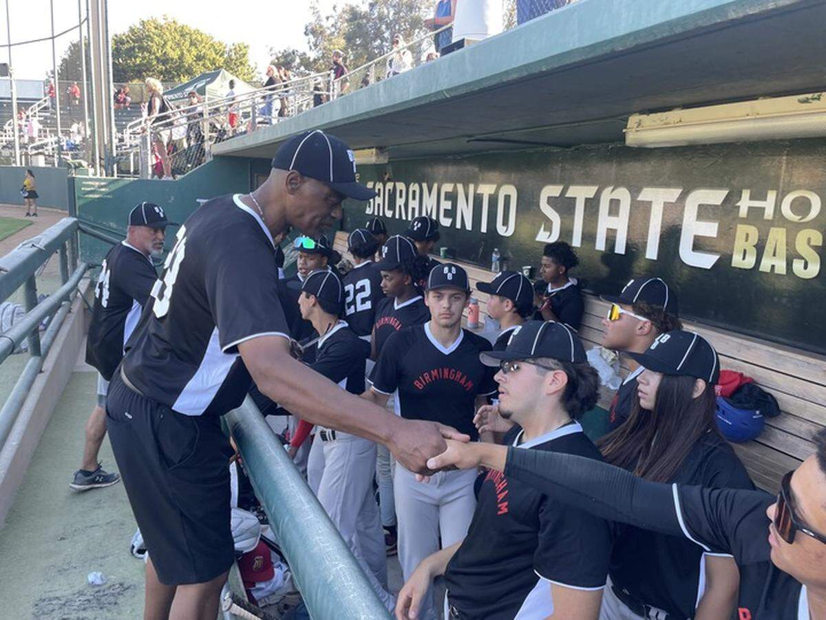 Former MLB player and Sacramento great, Ricky Jordan, congratulates his players on their effort in the exhibition game on Sunday, Sept. 22.