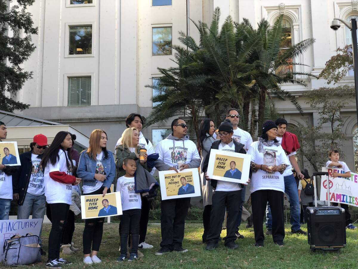 Tith Ton’s family members, including his parents and younger sister, participates in the rally to keep Tith home.