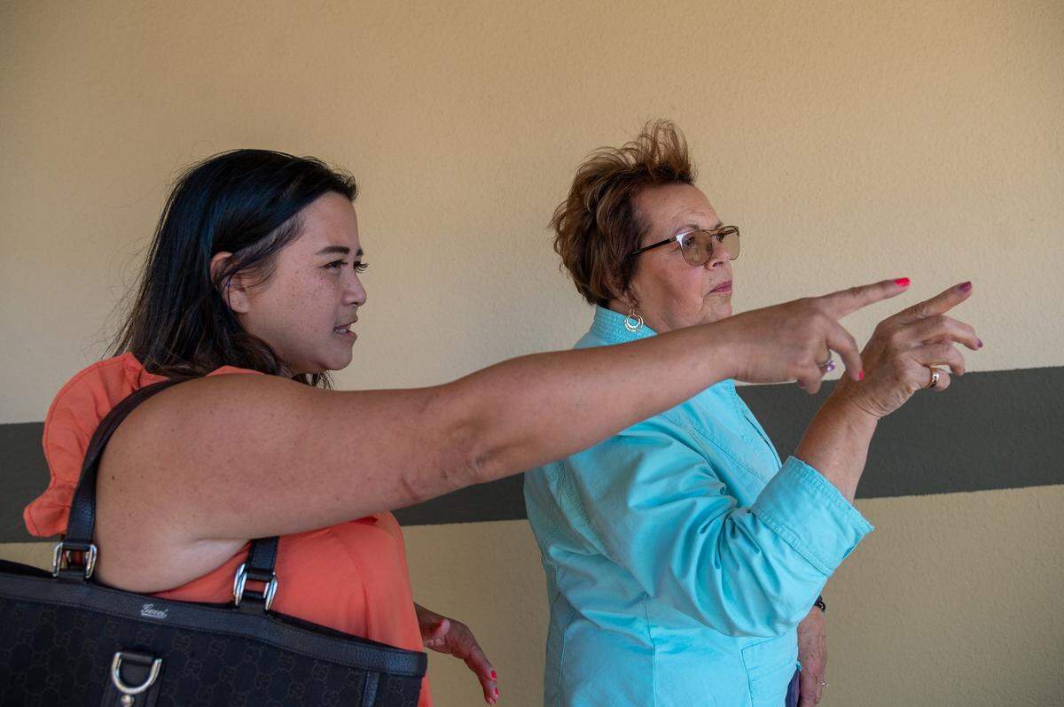 Thao Ha, left, and Judy Weldon look out on the playground at Cleveland School in June.&nbsp;“You have this guilt, when you think about the kids that couldn’t come home,”&nbsp;Ha said. “Especially if you see more violence … you watch the news and see all the mass shootings, all the gun violence, and you just feel so sad. Because you’re like, ‘Why does that happen even more? Why does it continue?’”