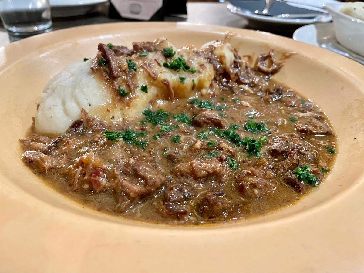 The Monk’s Cellar makes carbonnade flamande, a Flemish meat-and-potatoes stew.