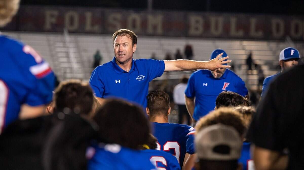 Folsom High School Bulldog head coach Paul Doherty talks to his team after their win against Monterey Trail last season at Folsom High School. The Bulldogs are seeking their 10th Sac-Joaquin Section championship since 2010 under coach Doherty.