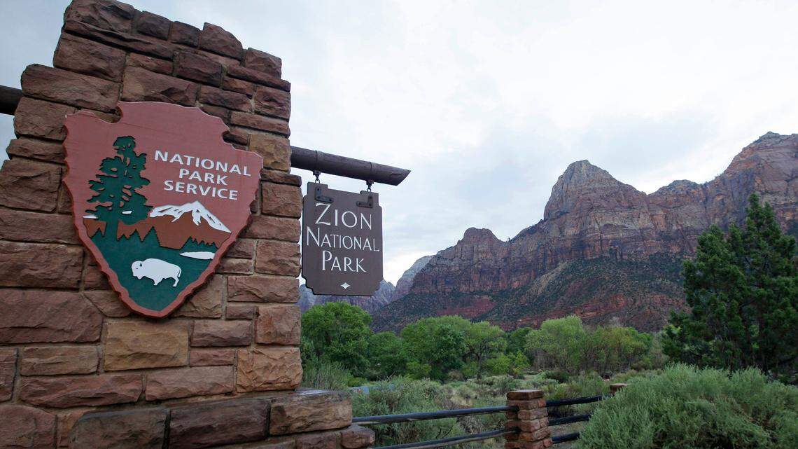 A 29-year-old Arizona woman remains missing after flash floods swept other hikers off their feet at Zion National park in Utah, rangers say.