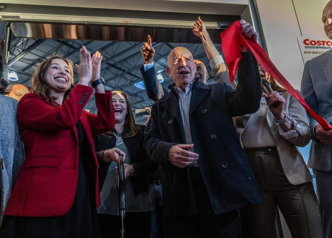 Sacramento City Councilwoman Karina Talamantes and Mayor Darrell Steinberg take part in the ribbon cutting for the Natomas Costco grand opening on Thursday, March 14, 2024.