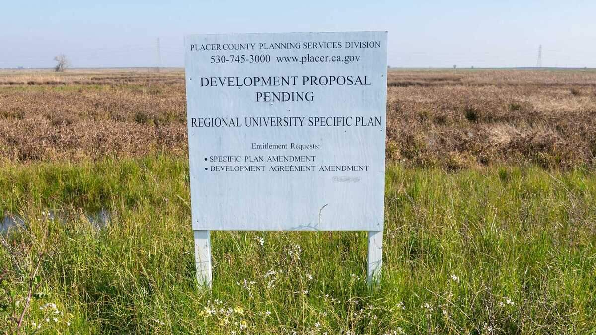 A sign marks the site of Hillsdale College on Thursday, Jan. 20, 2022 in Placer County. Hillsdale is on track to fulfill Tsakopoulos family’s vision of academia in the Placer suburbs. The private college paid $5.8 million to acquire 1,100 acres of farmland owned by the University Development Foundation, a nonprofit established by Tsakopoulos family.