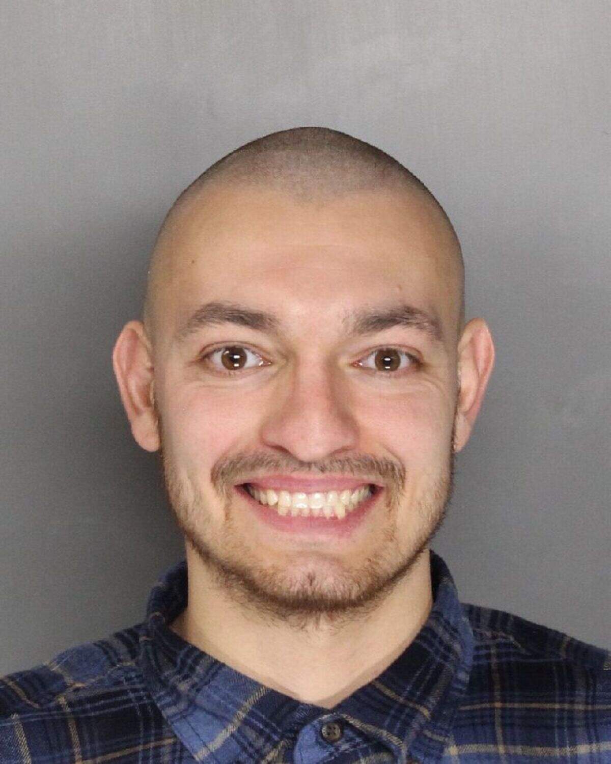 Daniel Arushanov is accused of impersonating an FBI agent at a North highlands Red Roof Inn. He was arrested Friday and has been named in a federal criminal complaint filed in court Monday.