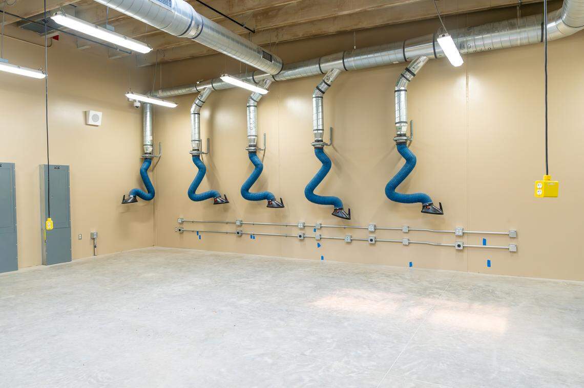 Blue tubes in the South Placer Jail’s new vocational training facility in Roseville stand ready to remove fumes, smoke and dust from workshops where welding will be taught. 