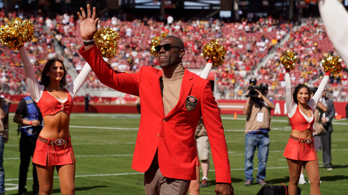 Former San Francisco 49ers wide receiver Terrell Owens waves to the crowd as he’s inducted into the team’s Hall of Fame at halftime of Sunday’s game against the Pittsburgh Steelers at Levi’s Stadium in Santa Clara.