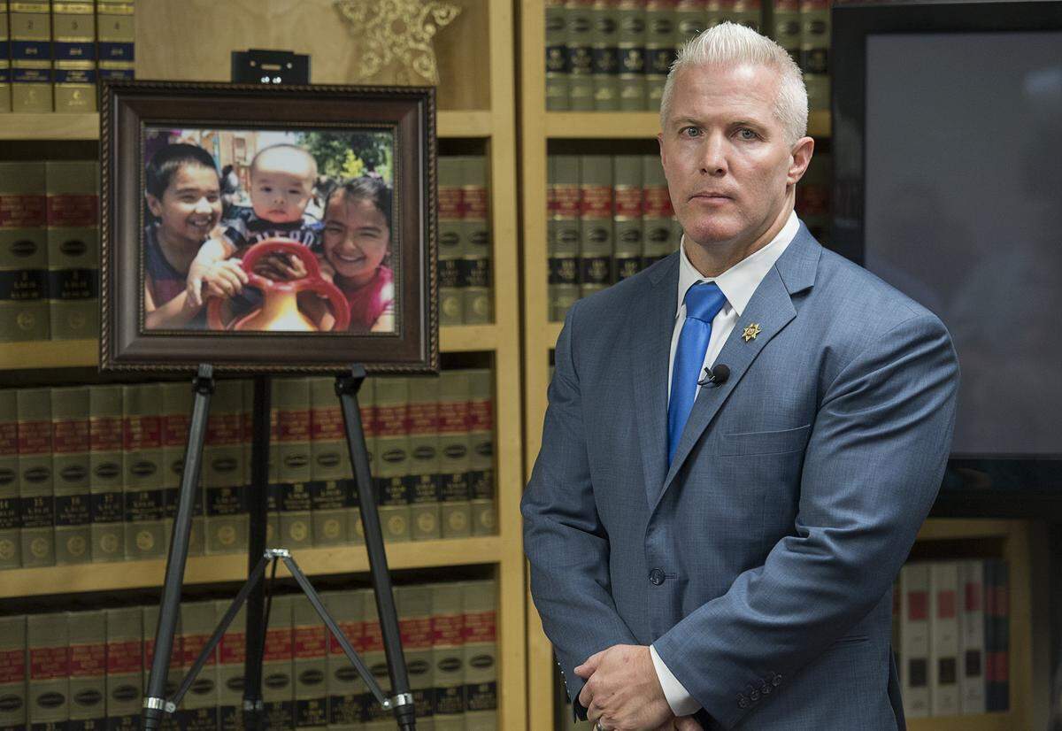 Yolo County District Attorney Jeff Reisig announces his decision to file charges against a West Sacramento resident, who later admitted to killing his three children, Kelvin, 11, Julie, 9, and Lucas, 7 months.