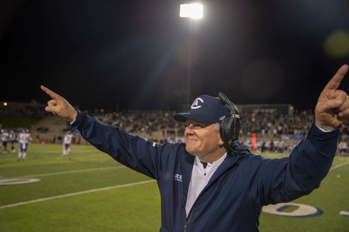 UC Davis football coach Dan Hawkins celebrates a win over Northern Iowa on in 2018 at Aggie Stadium.