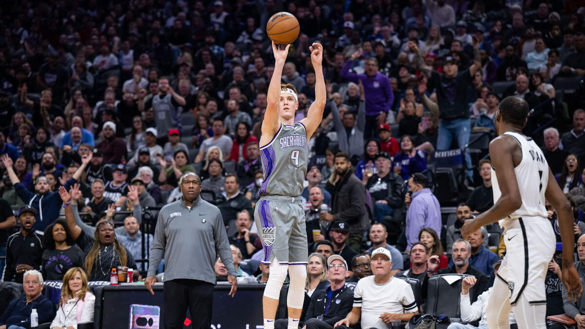 Sacramento Kings guard/forward Kevin Huerter (9) sinks a three point basket against the Brooklyn Nets during the first half of the NBA basketball game Tuesday, Nov. 15, 2022, at Golden 1 Center in Sacramento.