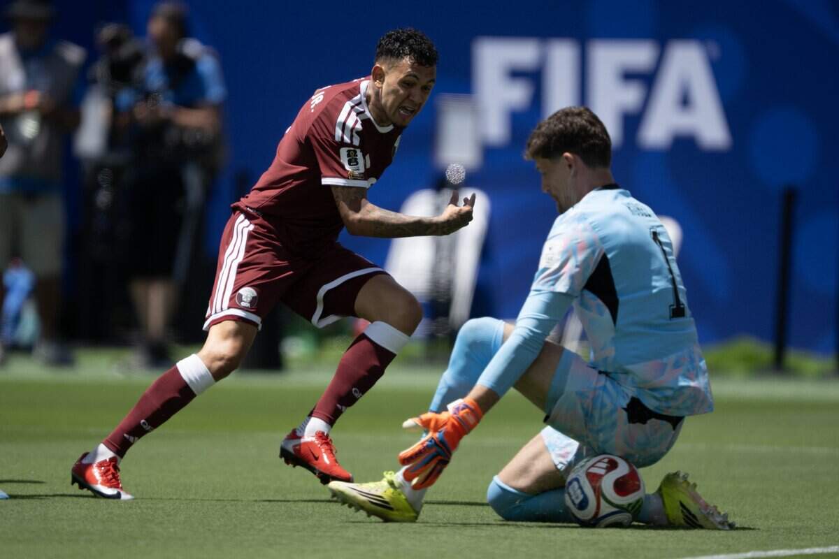 Switzerland goalkeeper Gregor Kobel stops the shot of Qatar midfielder Edmilson Junior in the first half between Qatar and Switzerland in the group stage of the 2026 World Cup on Saturday in Santa Clara.