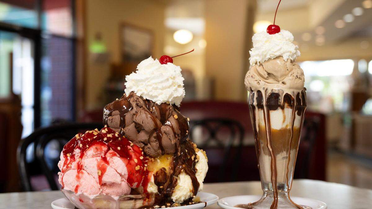 Two of the signature ice cream dishes at Fentons Creamery –the Banana Jr. and the Black and Tan Sundae – are ready to serve on Thursday in Vacaville. The creamery was founded in Oakland in 1894.
