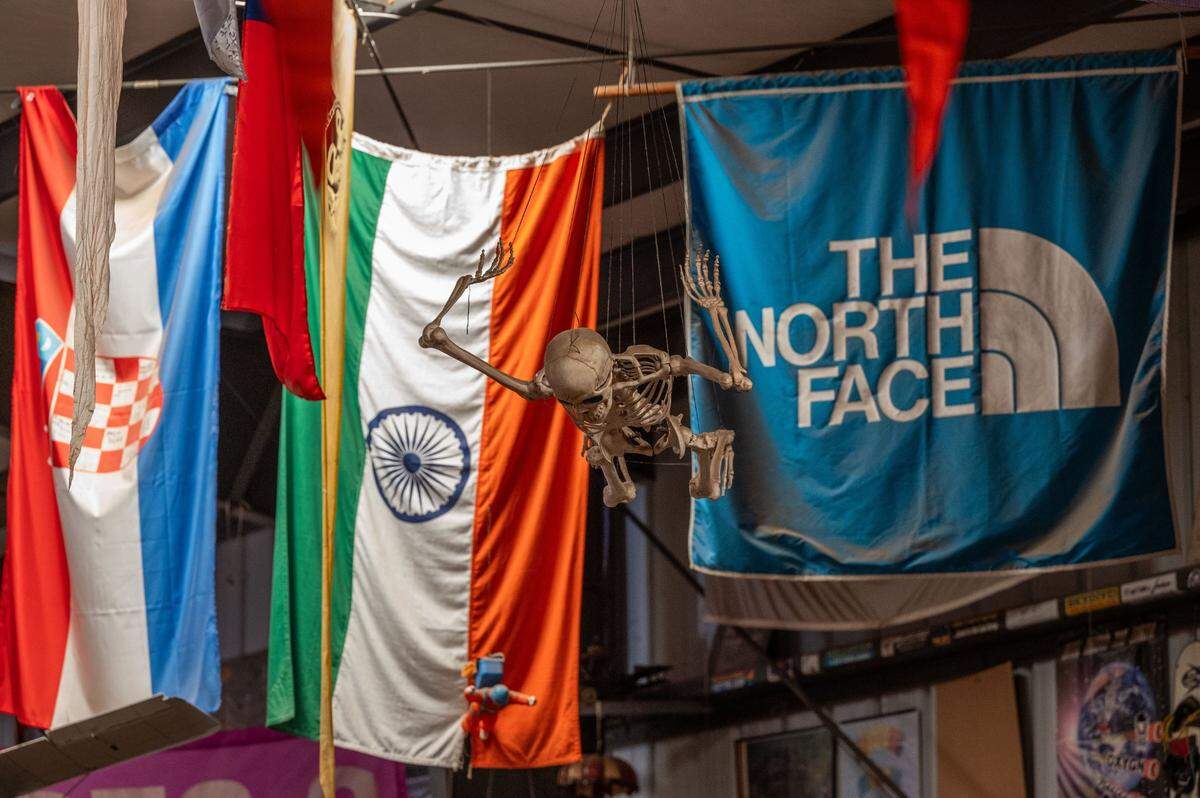 A plastic skeleton hangs from the ceiling at the Parachute Center skydiving facility in September. Since 1985, at least 28 people have died jumping at the center, which attracts people from around the world.