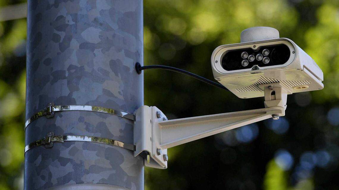 A license plate readers is affixed to a signal pole in Mission Hills, Kan. More than 70 California law enforcement agencies are violating state law by sharing automated license plate reader (ALPR) data with out-of-state agencies, putting out-of-state abortion seekers at risk, according to a trio of civil rights groups.