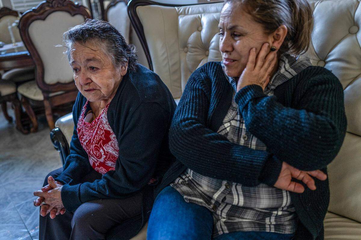 A tear falls down the cheek of Maria de Lourdes Ortiz de Anaya, left, who suffers from cancer, as she and her daughter Margarita Anaya de Chavez, worry about their housing options. “The doctor had mentioned if they didn’t get treatment due to the rare kind of cancer, she had six months to live,” Anaya de Chavez said.