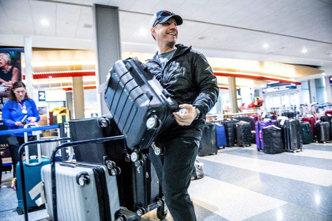 Southwest customer Chad Everett of Dallas is all smiles as he finds nine of his 10 pieces of luggage at Sacramento International Airport’s Terminal B on Thursday, four days after his family left them at the airport in Dallas. The bags had been checked before their flight was cancelled and could not be retrieved. Everett and his family of six drove from Dallas. “You just try to make the best out of everything,” said Everett. “For us it was great just to spend time with the kids.”
