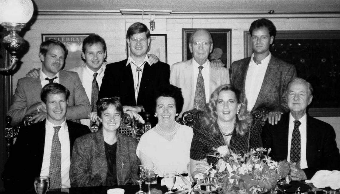 Members of the fourth and fifth generations fo the McClatchy family gather at the Fire House Restaurant in Old Sacramento in 1990. Back row: Brown Maloney, William McClatchy, Charles McClatchy, William Ellery McClatchy, Carlos McClatchy. Front row: Kevin McClatchy, Adair McClatchy, Betty Maloney, Molly Maloney Evangelisti, James B. McClatchy.