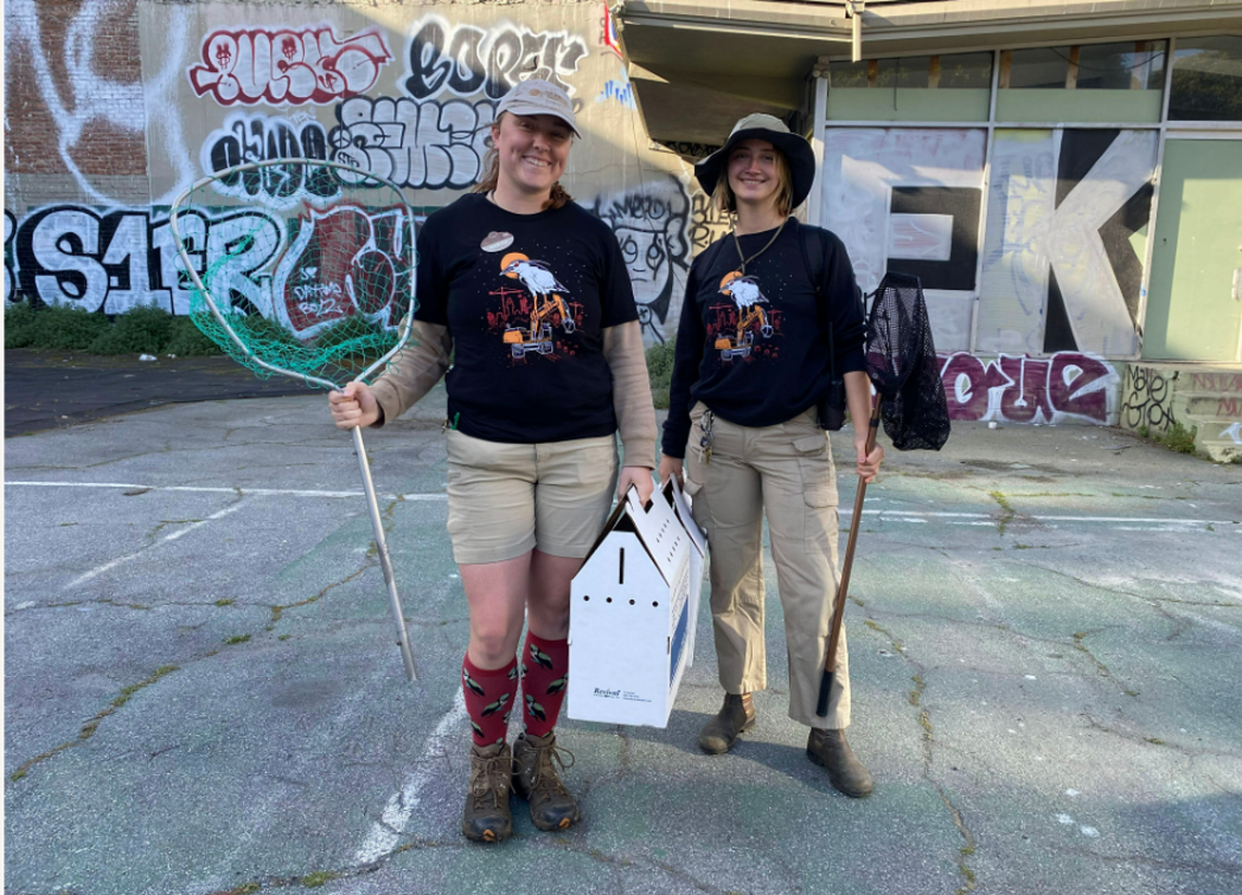 Heron Rescue Team members Marisa Riordan and Noelle Dohlin patrol downtown Oakland.