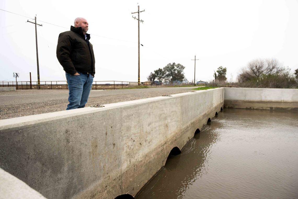 Matt Kaminski, a regional biologist with Ducks Unlimited, stands near the Santa Fe Canal during a wetlands tour earlier this month at the Grasslands Wildlife Management Area near Gustine.