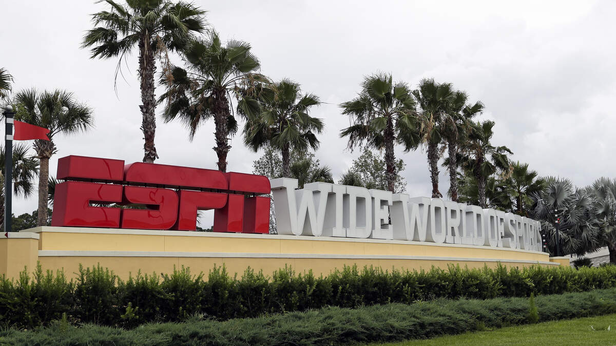 A sign marking the entrance to ESPN’s Wide World of Sports at Walt Disney World is seen Wednesday. The NBA will restart its season at Disney this summer.
