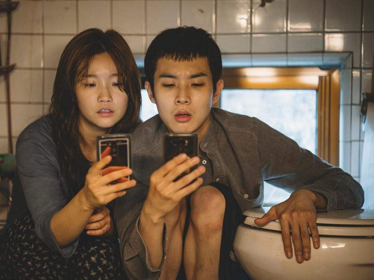 So-dam Park and Woo-sik Choi star in “Parasite.”