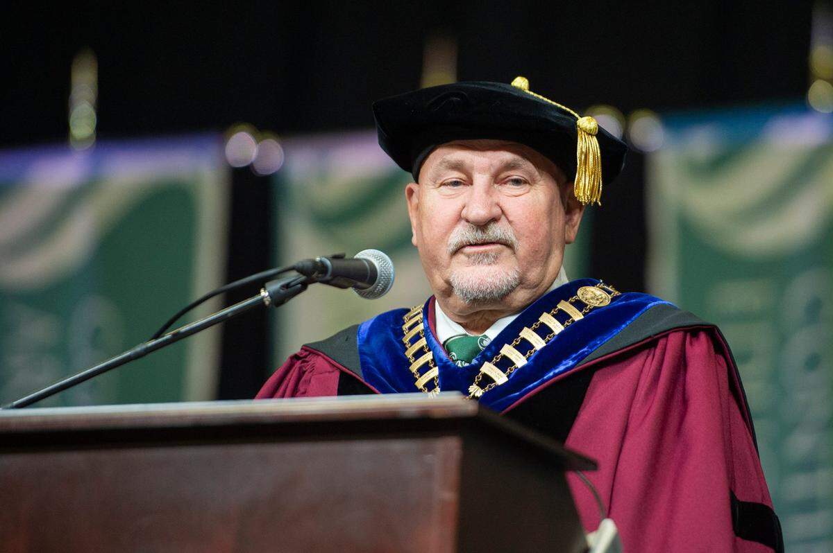 Retiring President Robert S. Nelsen speaks during the Sacramento State College of Business commencement in May at Golden 1 Center.