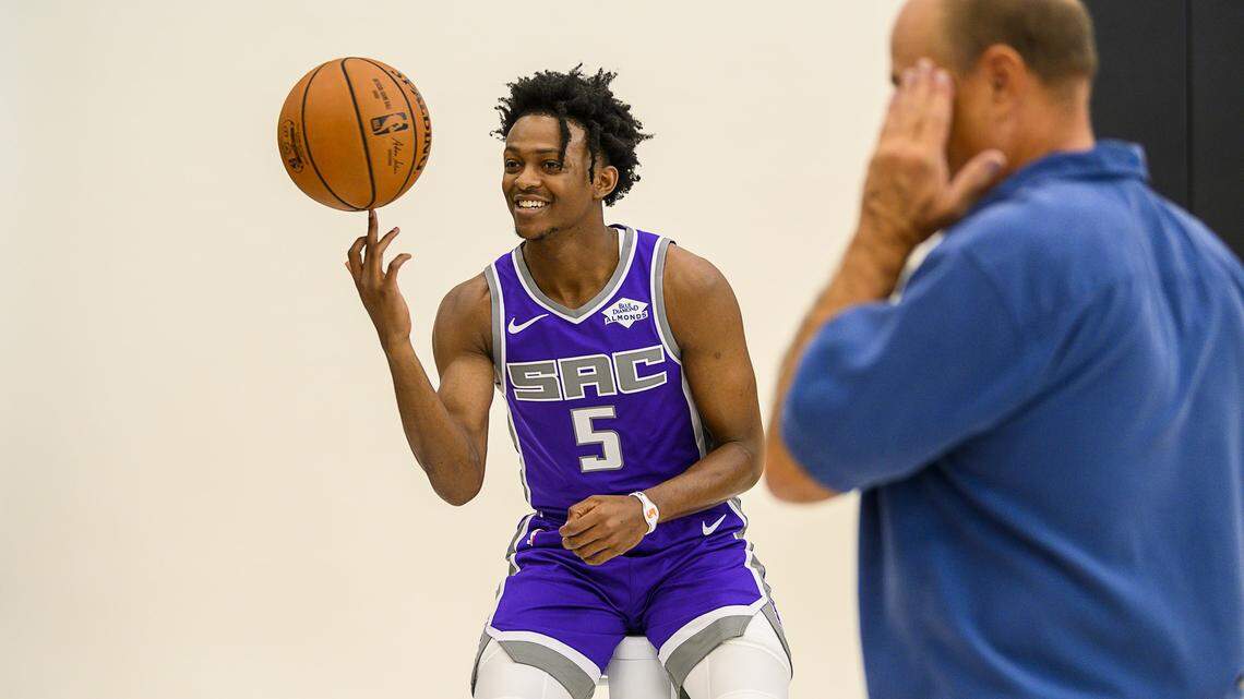 Kings point guard De’Aaron Fox spins the ball at a photo shoot during media day at Golden 1 Center on Sept. 27, 2019 in Sacramento.