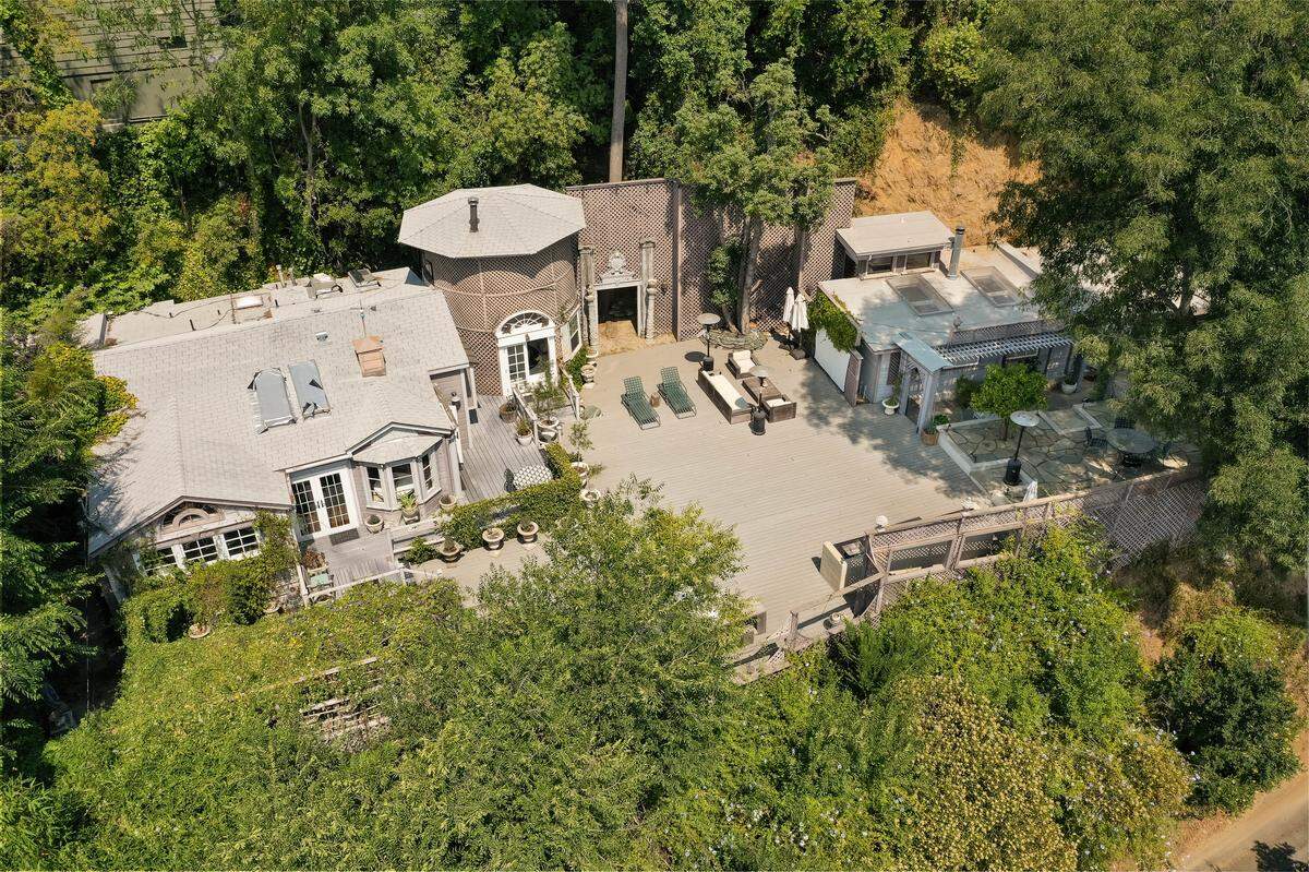 An iconic Laurel Canyon cottage in Los Angeles famed for hosting legends like John Lennon and Joni Mitchell is now for sale at $2.25 million.