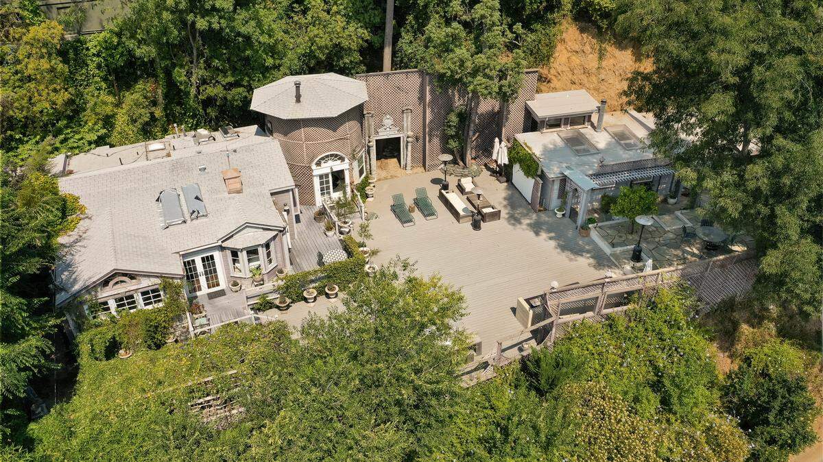 An iconic Laurel Canyon cottage in Los Angeles famed for hosting legends like John Lennon and Joni Mitchell is now for sale at $2.25 million.