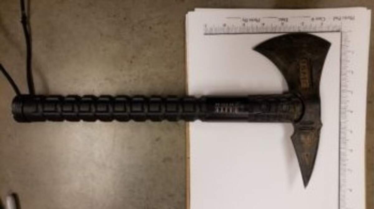 Redding police received reports of a man threatening people outside a gas station on Lake Boulevard with an ax.