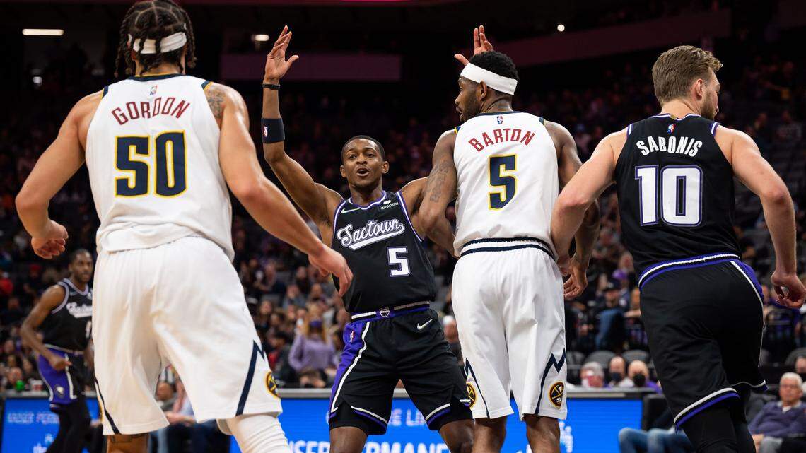 Sacramento Kings guard De’Aaron Fox (5) looks to the referee fora call after makes a shot against the Denver Nuggets during the first half of the NBA basketball game Thursday, Feb. 24, 2022, at Golden 1 Center in Sacramento.