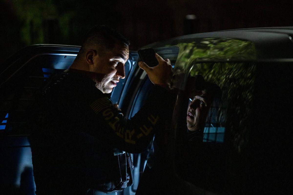 Sacramento Sheriff’s deputy Lopez recites the Miranda warnings to a man as being arrested for propositioning a female deputy posing as prostitute on Watt Avenue in North Highlands on Friday.